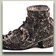 Noidan kenk---Witch's shoe. Pronssi---Bronze